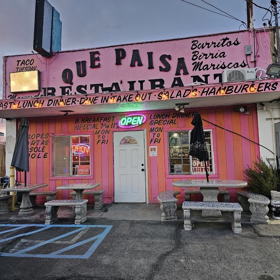 Casual Mexican restaurant dining room with table service.